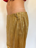 Load image into Gallery viewer, GOLD LAMÉ TROUSERS
